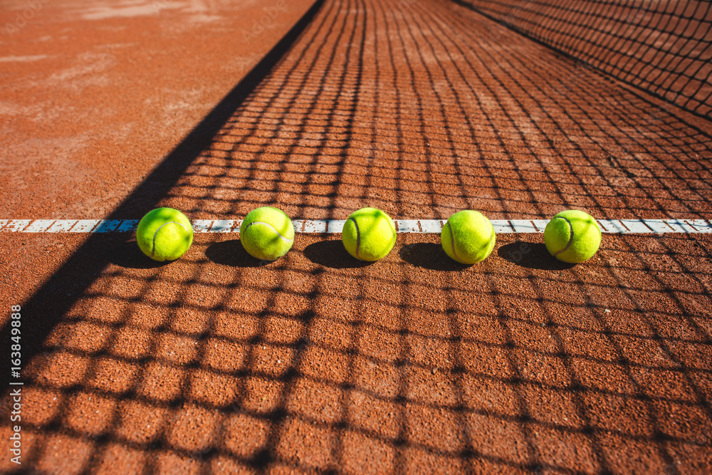 Tennis court line with balls