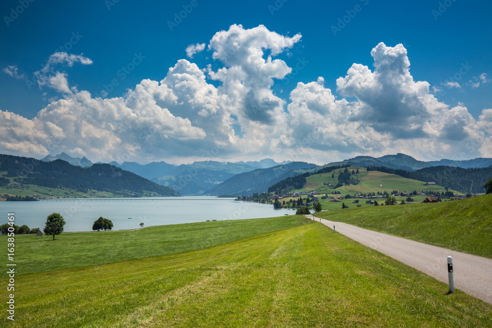 Obraz premium Fantastic landscape at noon over the lake in the Swiss Alps, Europe.