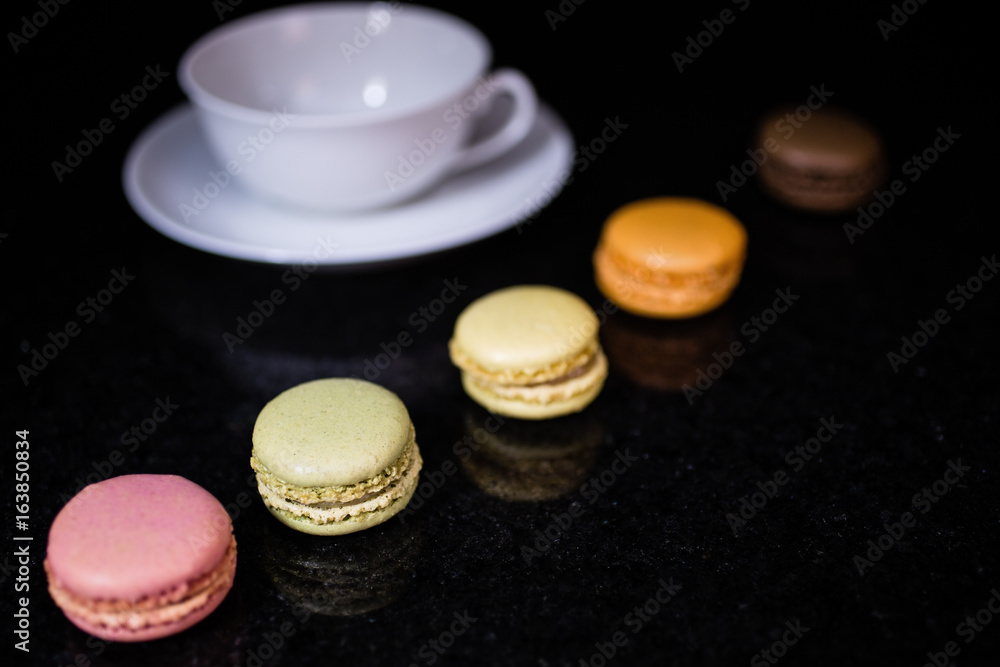 French Macarons and a tea cup French Macarons and a tea cup