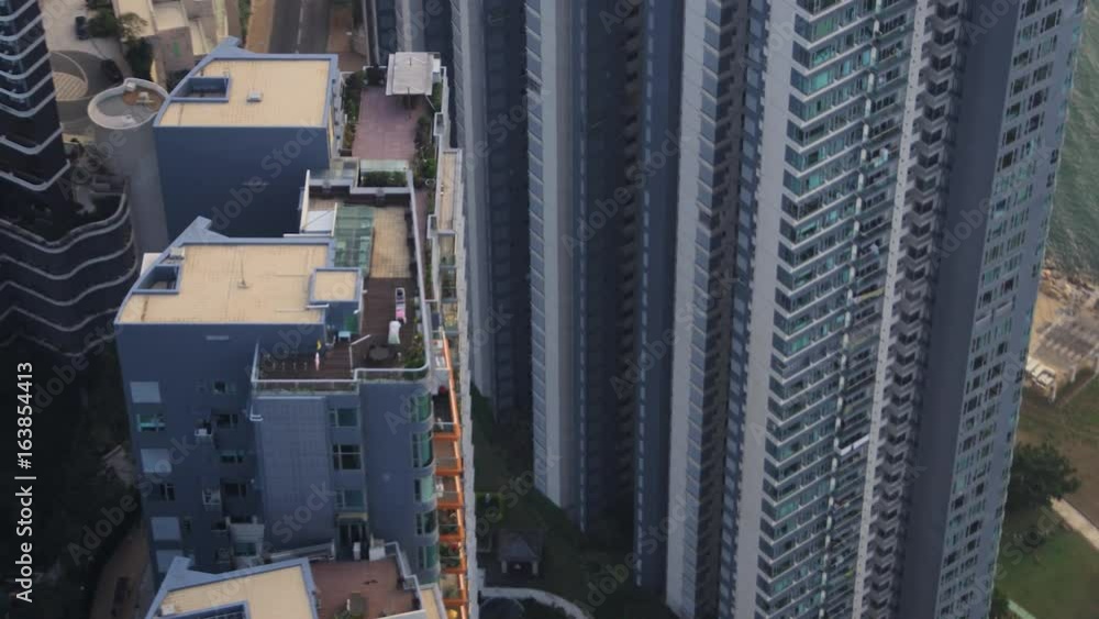 Hong Kong Aerial v187 Closeup birdseye view flying low around condominium complex Hong Kong Aerial v187 Closeup birdseye view flying low around condominium complex