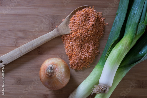 Red Lentils on Wooden Spoon with Leeks and Sweet Onion