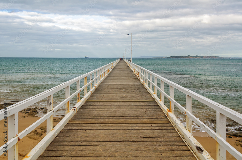 Point Lonsdale Pier on an overcast autumn afternoon - Victoria, Australia