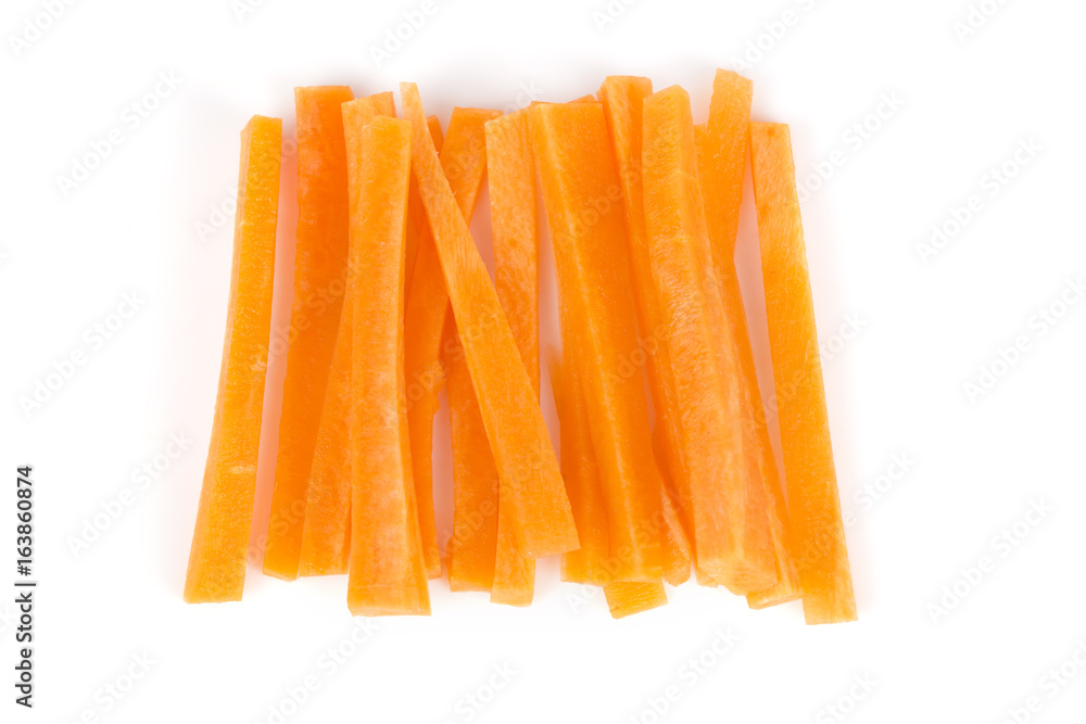 Chopped carrot sticks on white background. Chopped carrot sticks on white background.