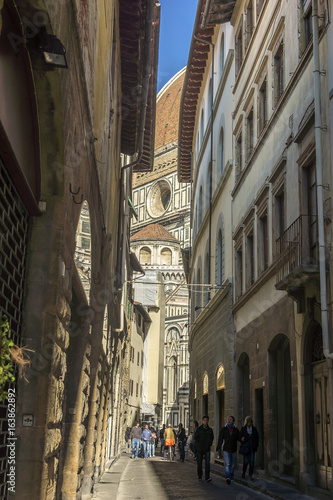 Florence street and The Duomo, Cathedral in Florence, Italy