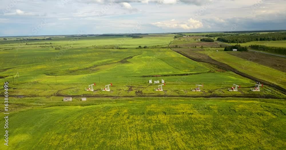 Oil pumping stations in operation aerial view Oil pumping stations in operation aerial view