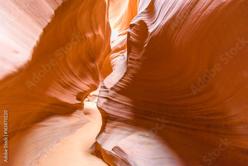 Path through lower Antelope Canyon - located on Navajo land near Page, Arizona, USA - beautiful colored rock formation in slot canyon in the American Southwest