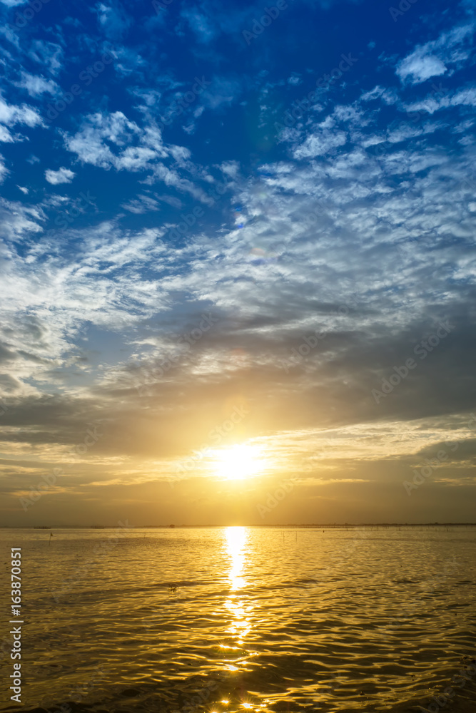 Sunset sky on the lake in south of Thailand., unfocused image.