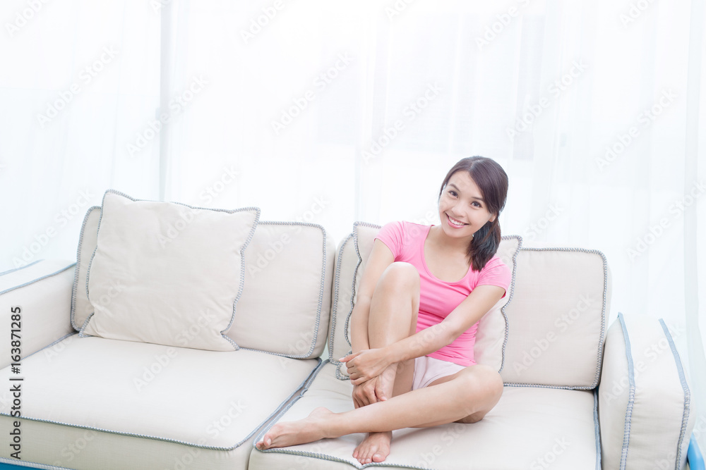 woman sit on sofa woman sit on sofa