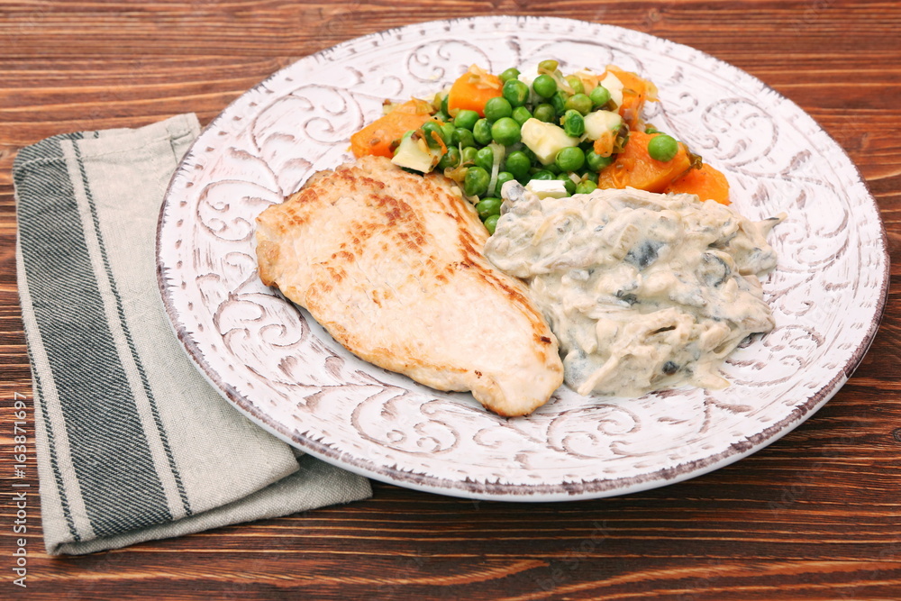 Turkey fillet with mushrooms in cream sauce and vegetables Turkey fillet with mushrooms in cream sauce and vegetables