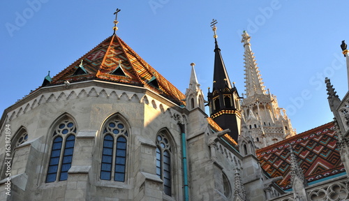 Matthiaskirche auf dem Schlossberg vor strahlend blauem wolkenlosen Himmel photo