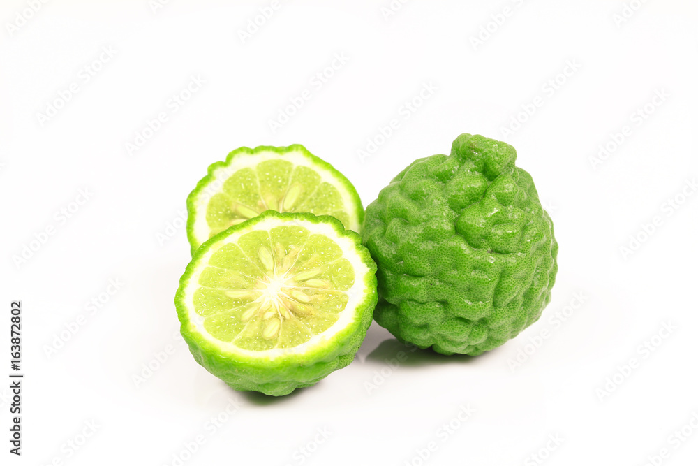 Kaffir lime and kaffir lime leaf on white background Kaffir lime and kaffir lime leaf on white background