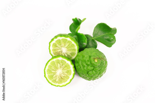 Kaffir lime and kaffir lime leaf on white background