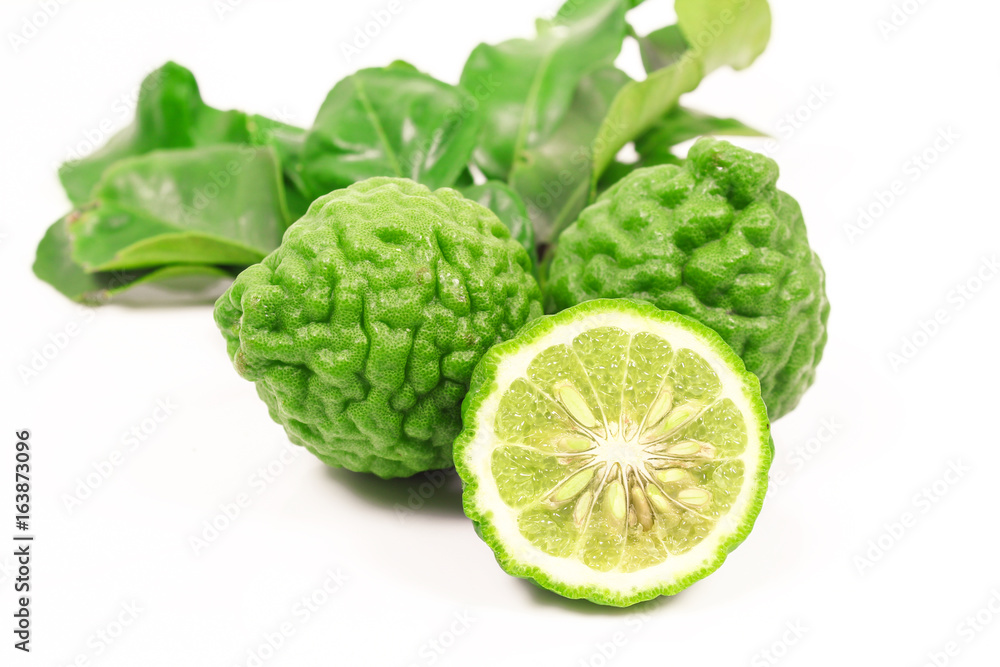 Kaffir lime and kaffir lime leaf on white background Kaffir lime and kaffir lime leaf on white background