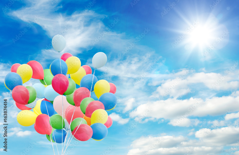 Happiness, summer, wedding, birthday, honeymoon party: Multicolor ballons, blue sky, clouds and sun :)