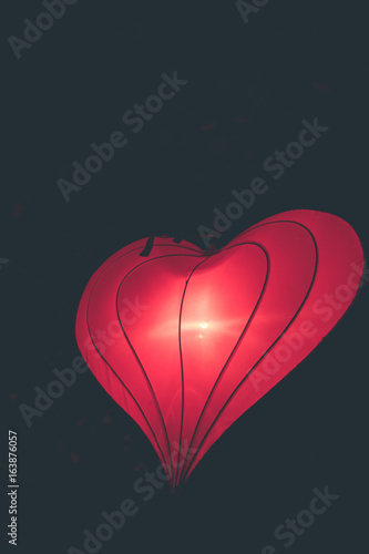 Hanging lanterns heart shape on a light festival on Bali island, Indonesia.