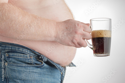 fat man with carbonated drink