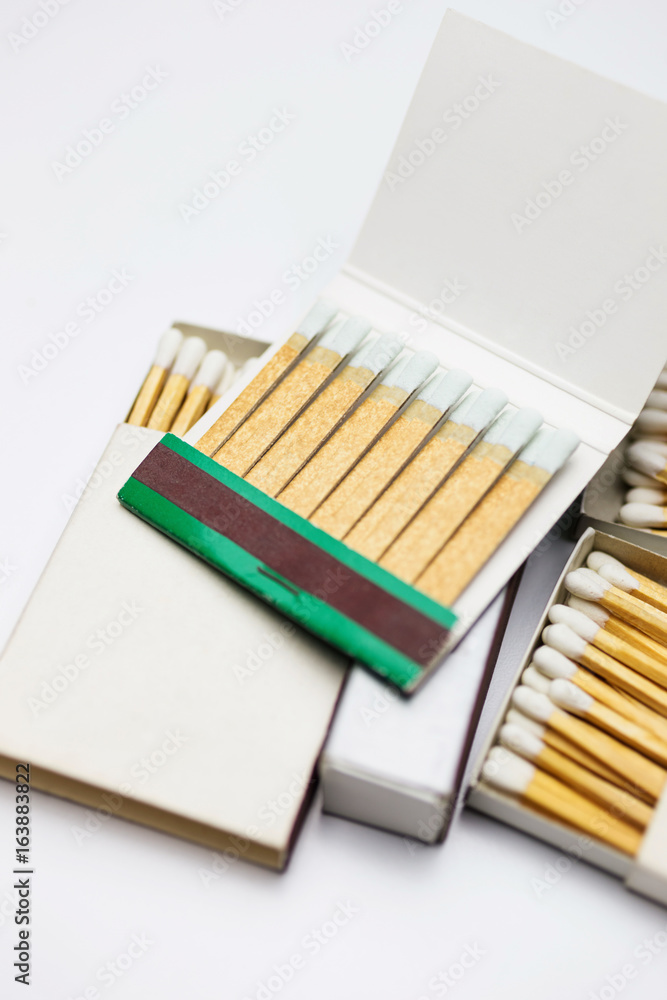 Fototapeta premium Closeup of matchboxes, isolated on white