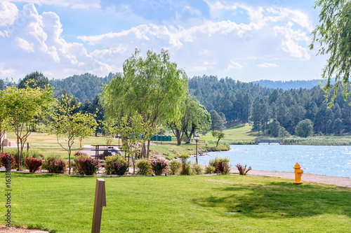 Beautiful green park with fountains and water lake. Ruidoso, New Mexico, United states of America photo