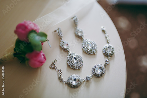 wedding jewelry, white earrings and bracelet bride, wedding ceremony, the bride's morning, preparing for the wedding
