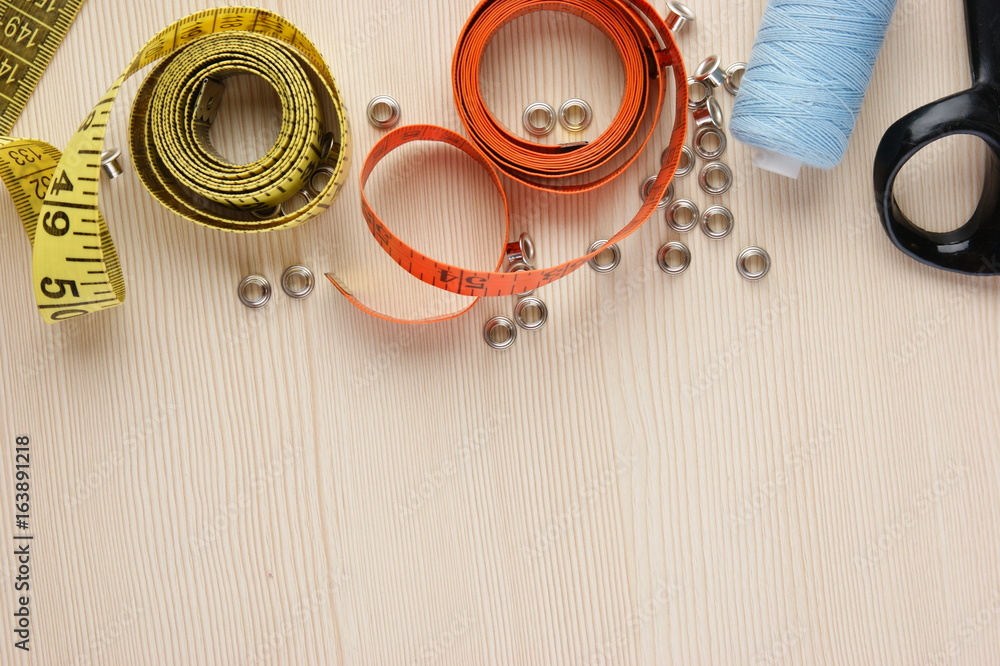 Frame sewing supplies on the table Frame sewing supplies on the table