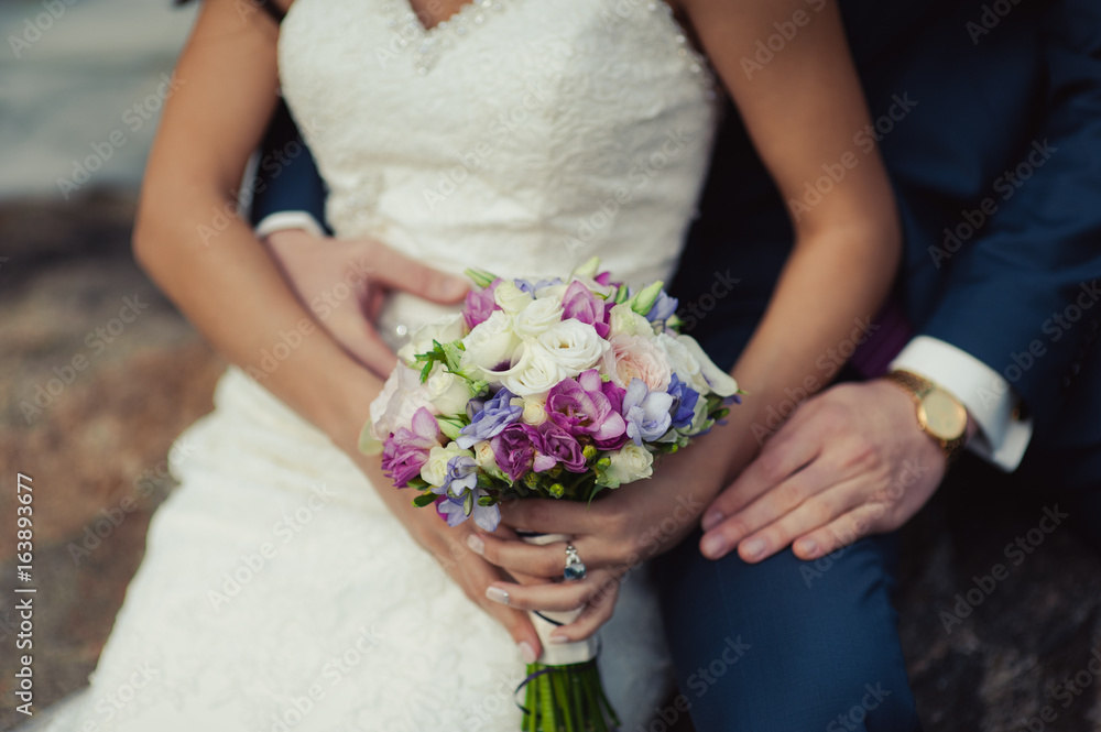 Bride holding big wedding bouquet on wedding ceremony Bride holding big wedding bouquet on wedding ceremony