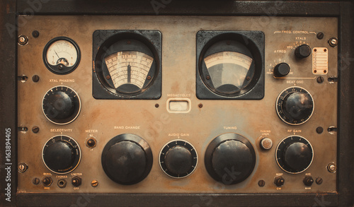 The old classic rack box of military communication radio bandswitching station. Military communications receiver or radio communication control panel grunge style.