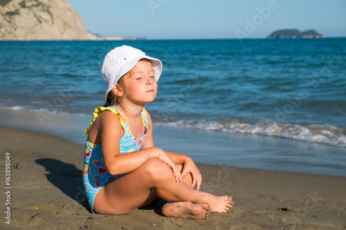 Cute girl having fun on a beach