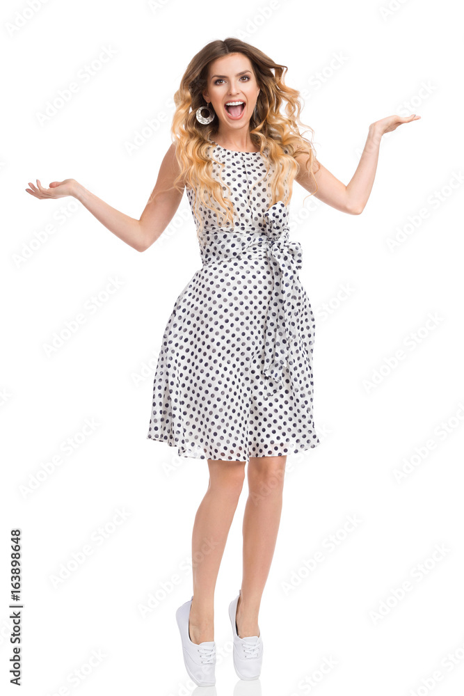 Excited Shouting Woman Is Standing Tiptoe With Arms Outstretched Excited Shouting Woman Is Standing Tiptoe With Arms Outstretched