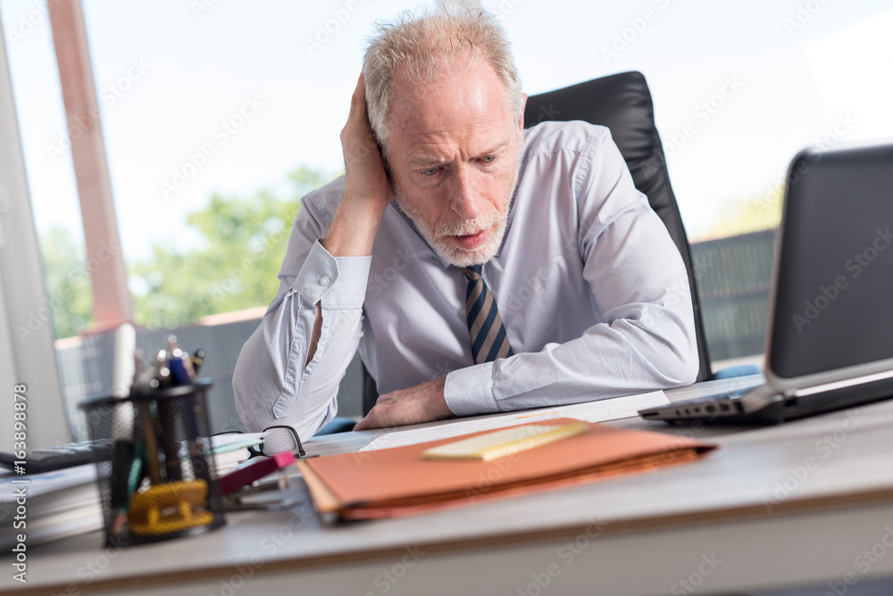 Portrait of concerned businessman Portrait of concerned businessman