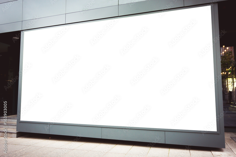 Fototapeta premium Mock up of store blank showcase window in a city