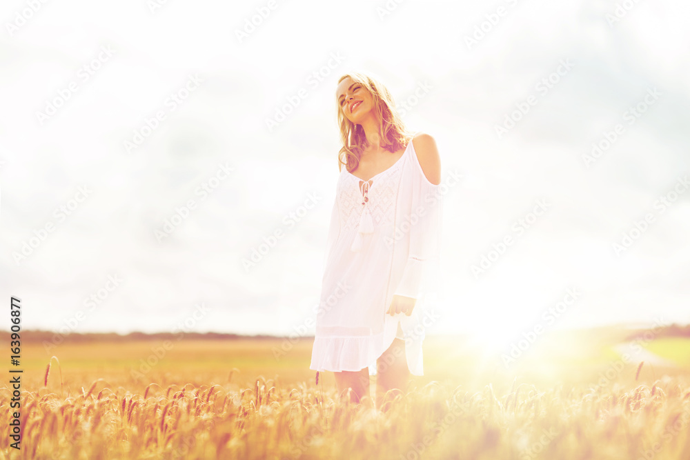 smiling young woman in white dress on cereal field smiling young woman in white dress on cereal field