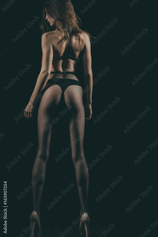 Woman with fit body and long muscular legs