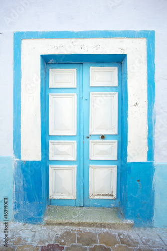 blue-white door in Tunisia © sergejson