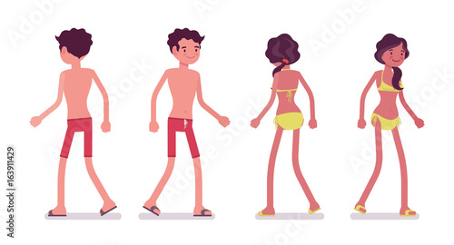 Young man and woman in summer beach outfit, walking