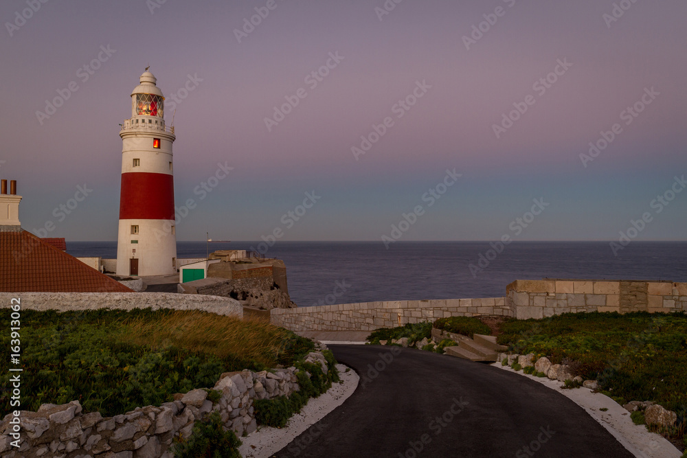 shining light in lighthouse on Mediterranean