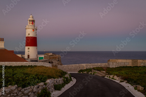 shining light in lighthouse on Mediterranean