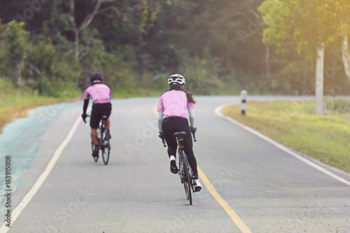 Motion blurry of Asian women Cycling during the race on road © tuiphotoengineer