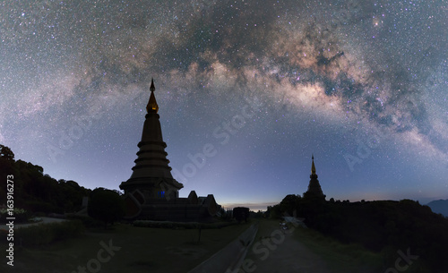 Milky way and stars at Doi Inthanon, the magnificent relics. Phra Maha Dhatu Nabhamethanidol and Nabhapolbhumisiri (The Great Holy Relics Pagoda )Chiang Mai, Thailand . close up . photo