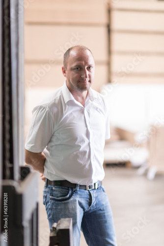 designer in his furniture manufacturing workshop