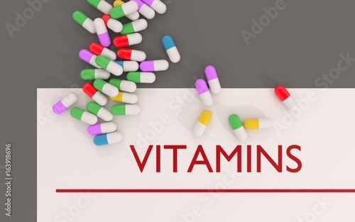 3d illustration of vitamins title or header on the sheet with some colorful pills 