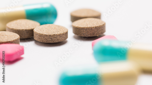 Pills on white background