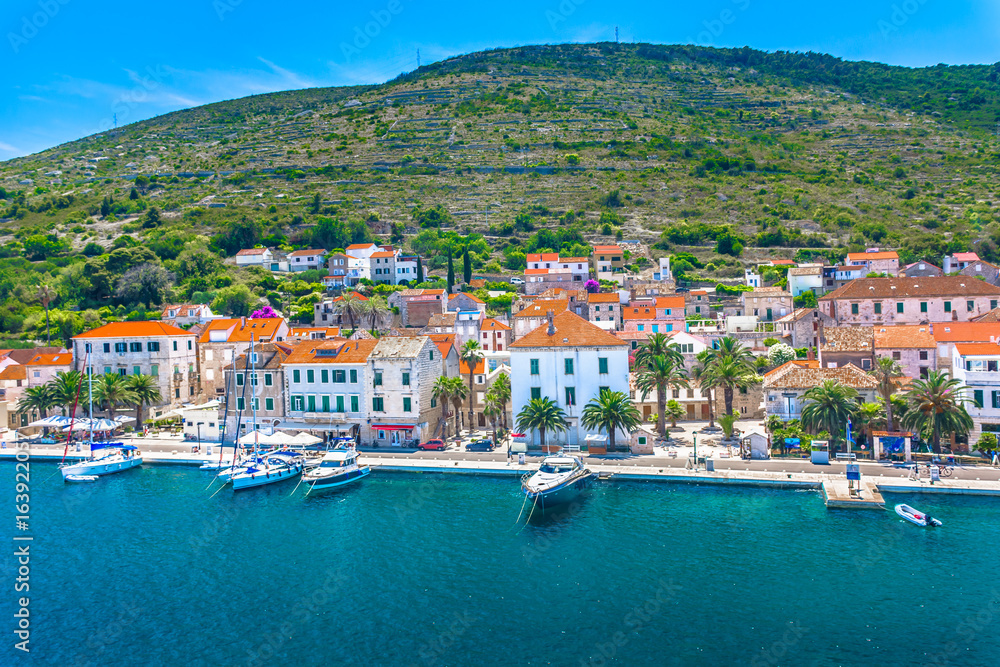 Vis island landscape. / Aerial coastal view at town Vis in Croatia, famous european travel resort in Mediterranean. 