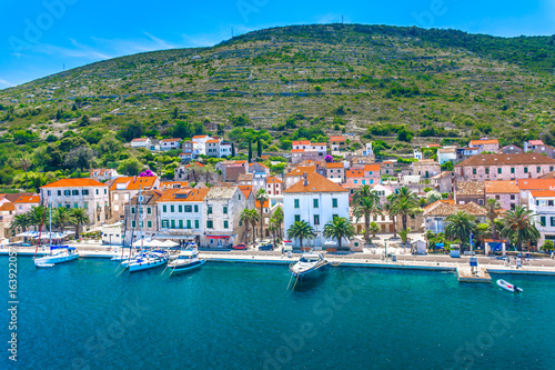 Vis island landscape. / Aerial coastal view at town Vis in Croatia, famous european travel resort in Mediterranean. 