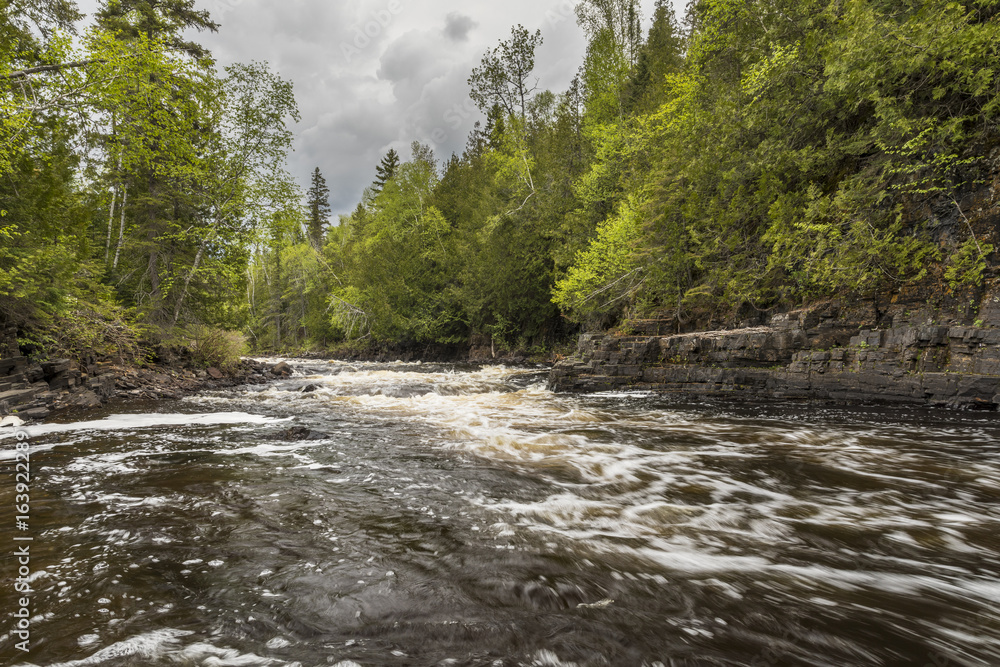 Current River Cascades / A river with cascading rapids in Ontario Canada.
