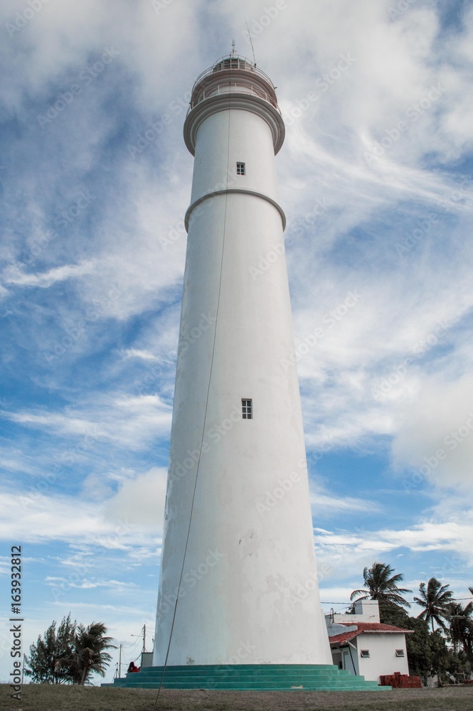lighthouse with bright sky