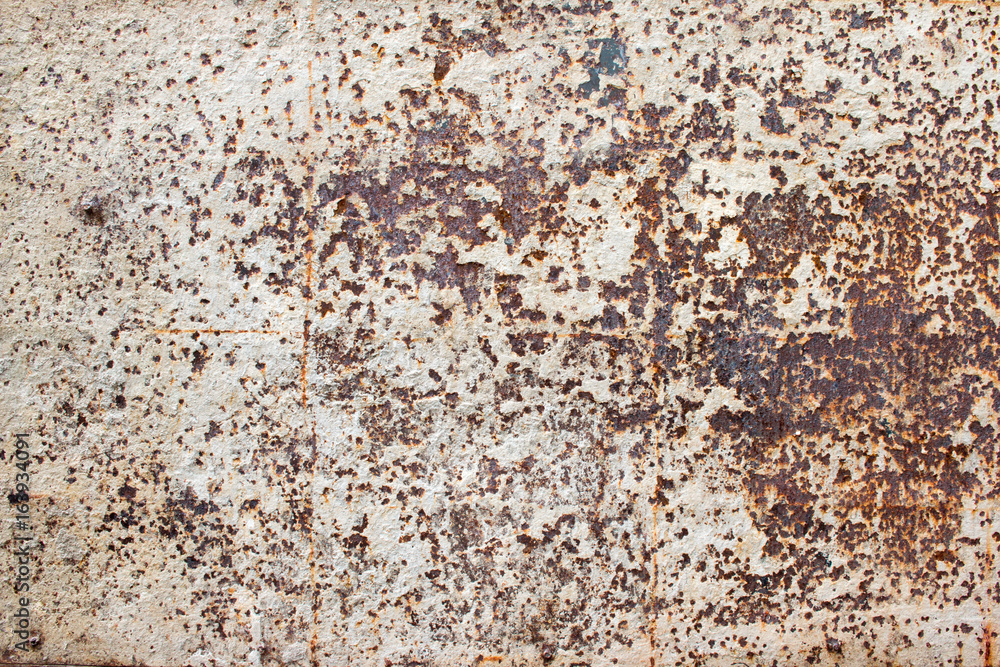 Detailed photo texture of rust old white painted metal wall. Old metal steel iron rust texture on background. Grunge rusty metal surface texture. Detailed photo texture of rust old white painted metal wall. Old metal steel iron rust texture on background. Grunge rusty metal surface texture.