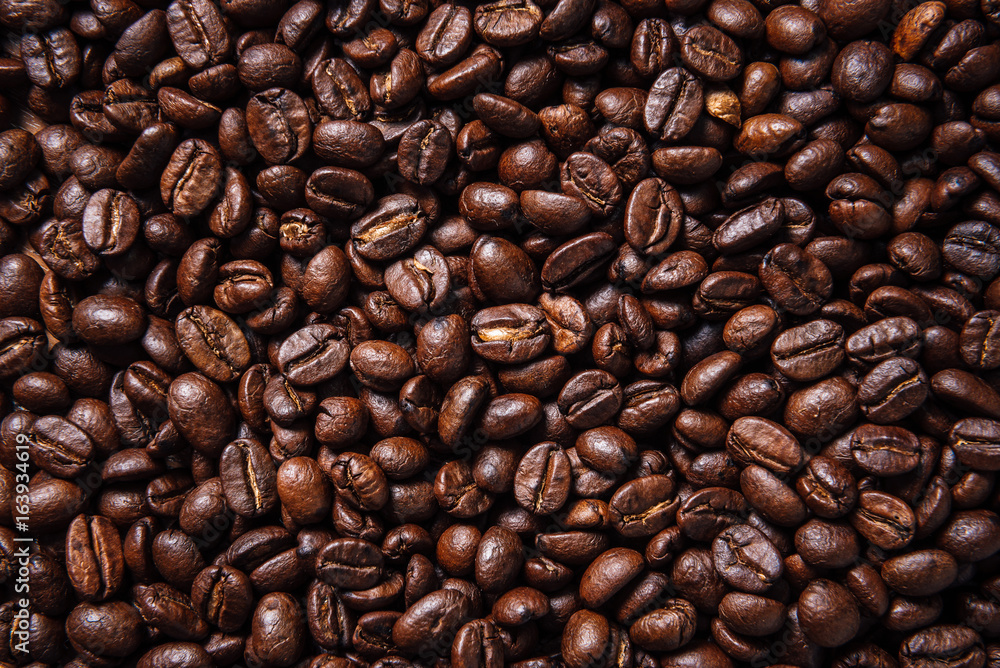 Texture of roasted ready to drink coffee close-up.Coffee Bean Scene.BlackGround Coffee. Texture of roasted ready to drink coffee close-up.Coffee Bean Scene.BlackGround Coffee.