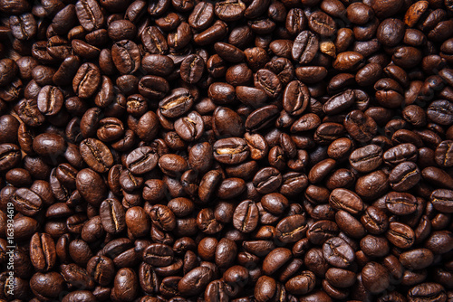 Texture of roasted ready to drink coffee close-up.Coffee Bean Scene.BlackGround Coffee.