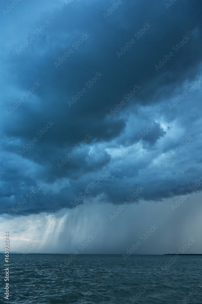 Big powerful storm clouds over tke Lake Balaton of Hungary