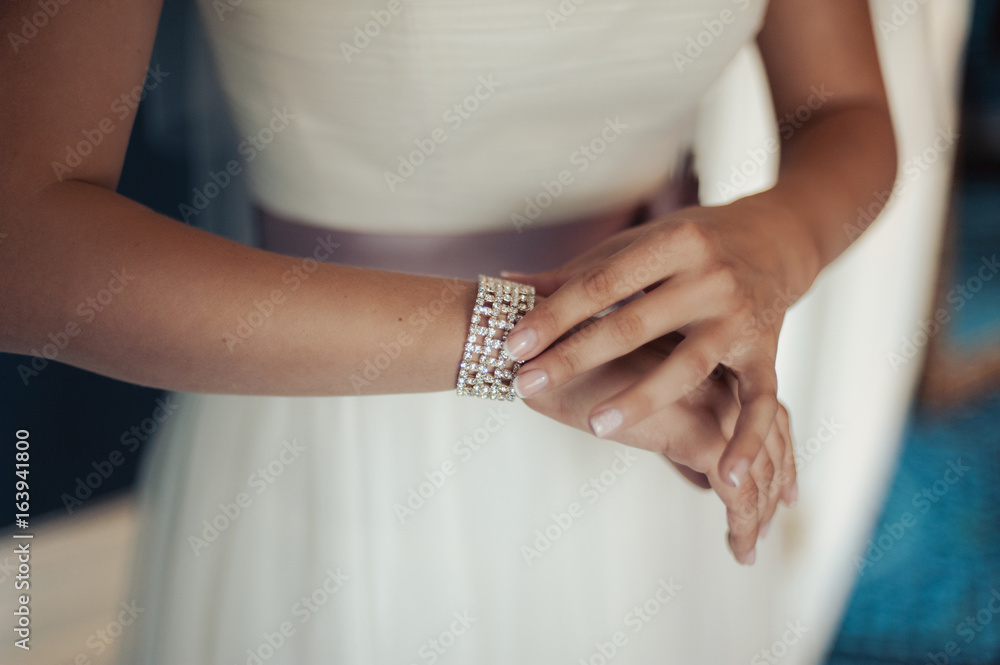 Bracelet on the bride's hand. Beautiful jewelry for the bride